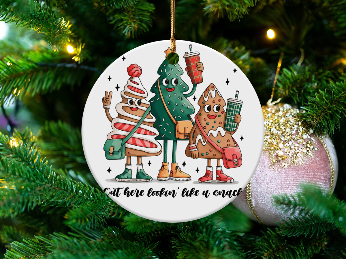 Three cartoon holiday characters with drinks, "Out here lookin' like a snack" text.
