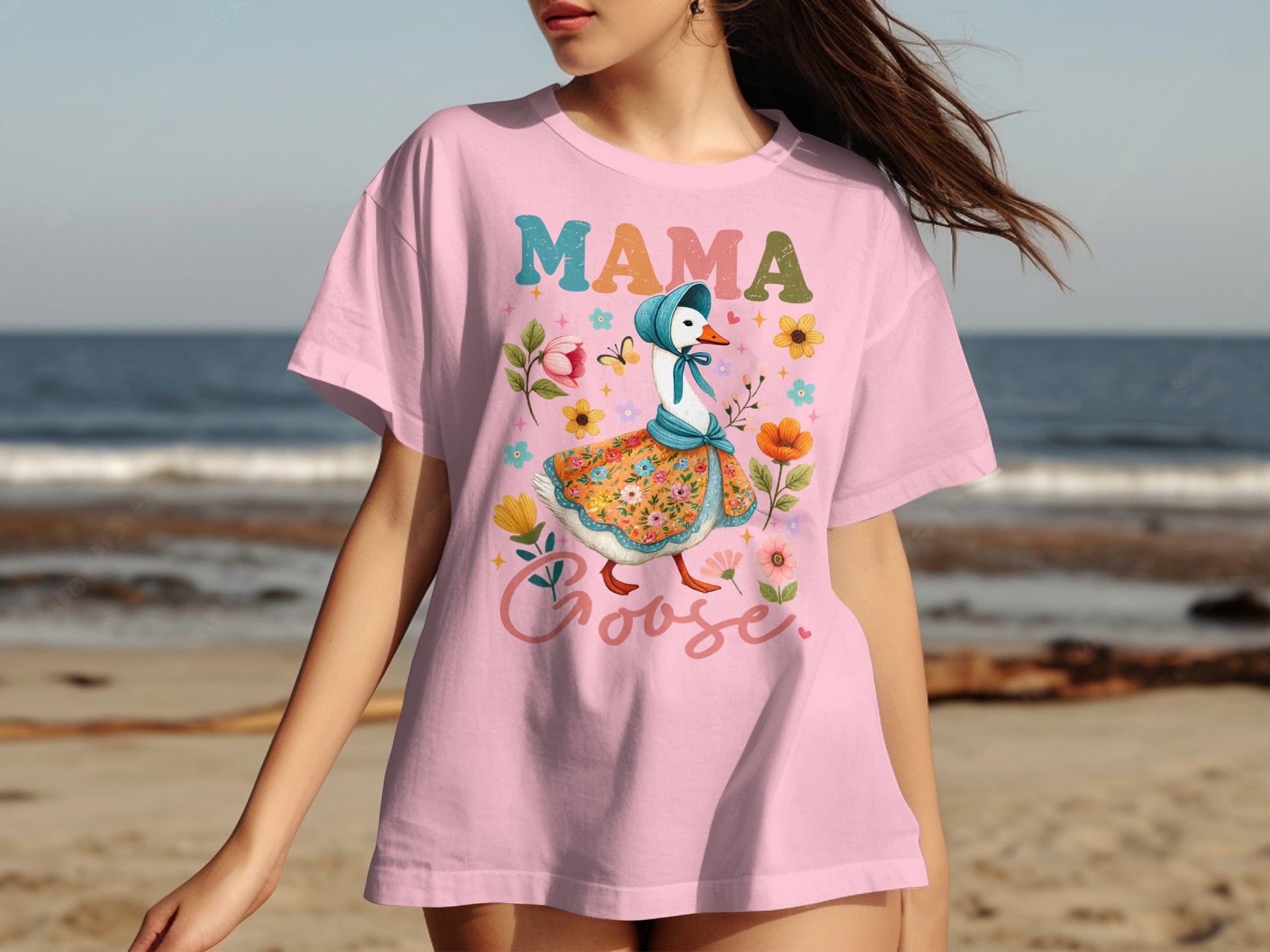 Mama Goose t-shirt with colorful floral designs and a goose illustration.