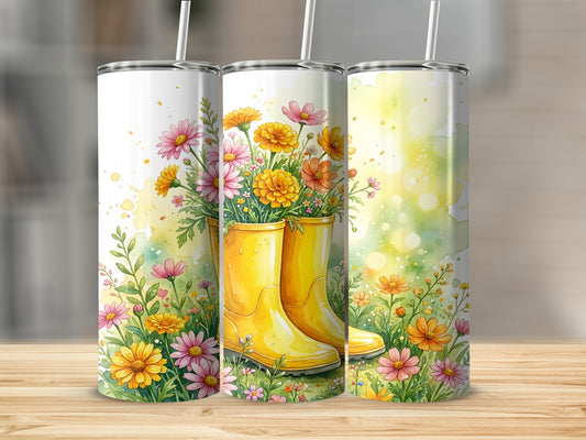 Yellow rain boots overflowing with colorful spring flowers on a wooden surface.