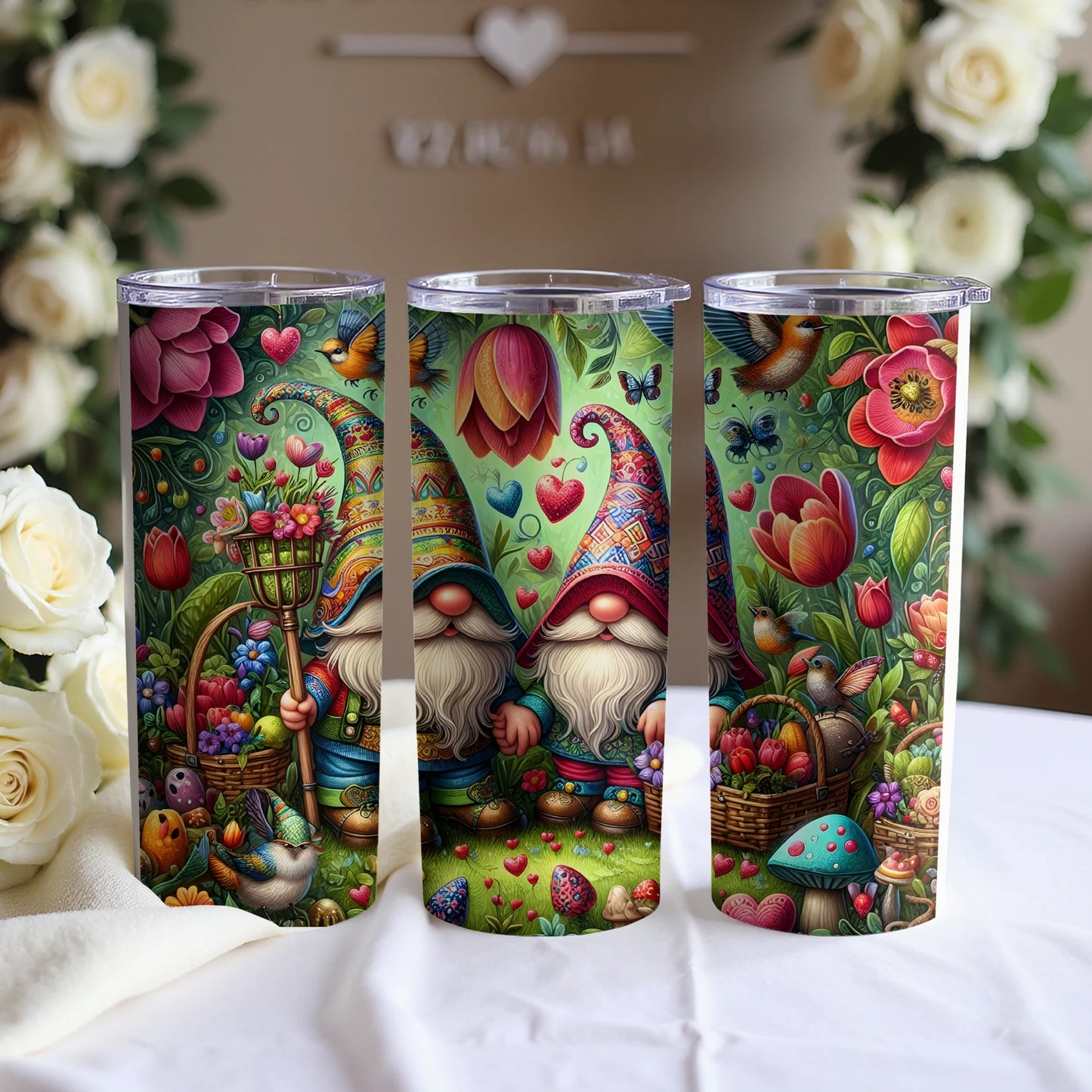Three gnomes in colorful hats and outfits surrounded by flowers and greenery.