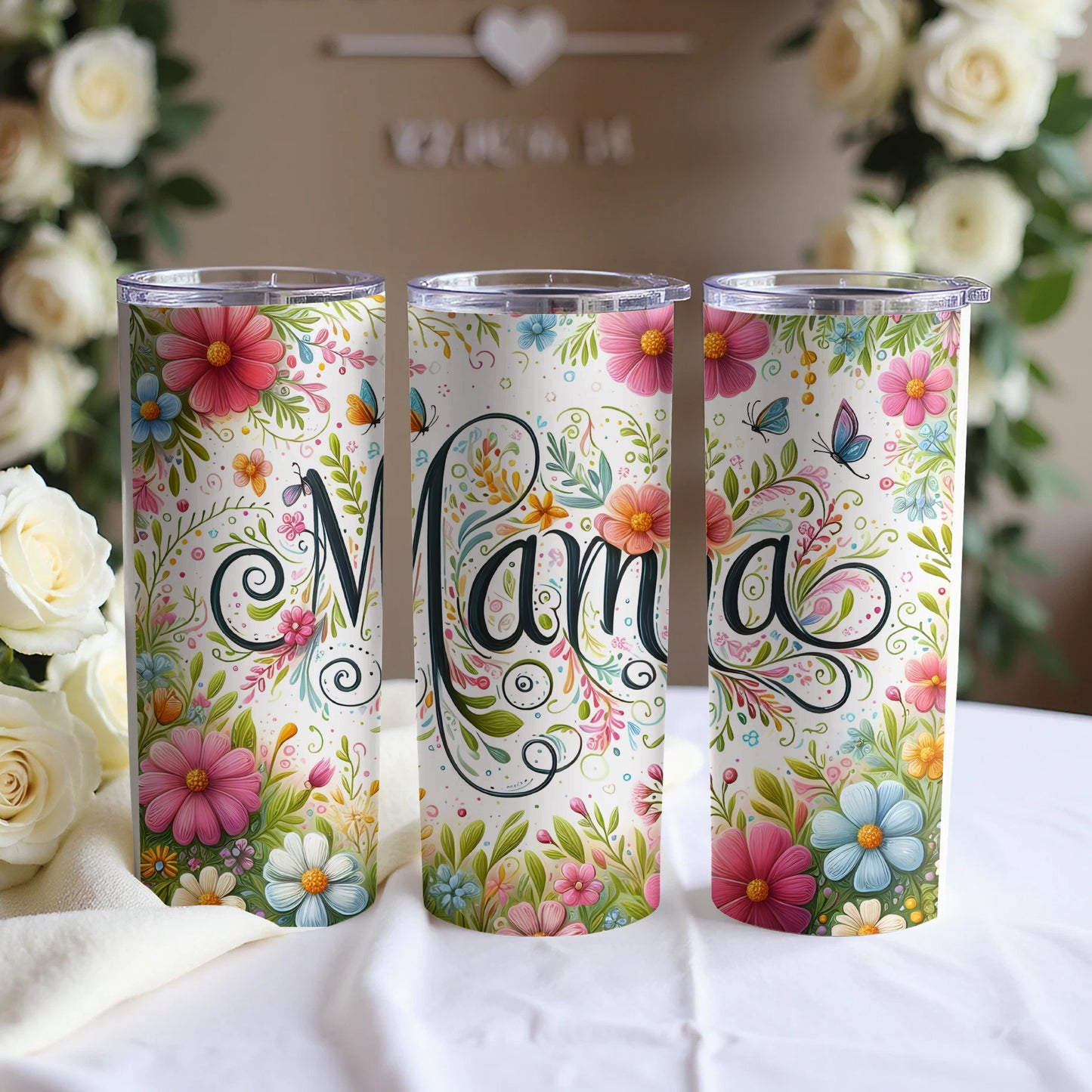 Floral tumbler with "Mama" text in cursive, three tumblers arranged side-by-side.