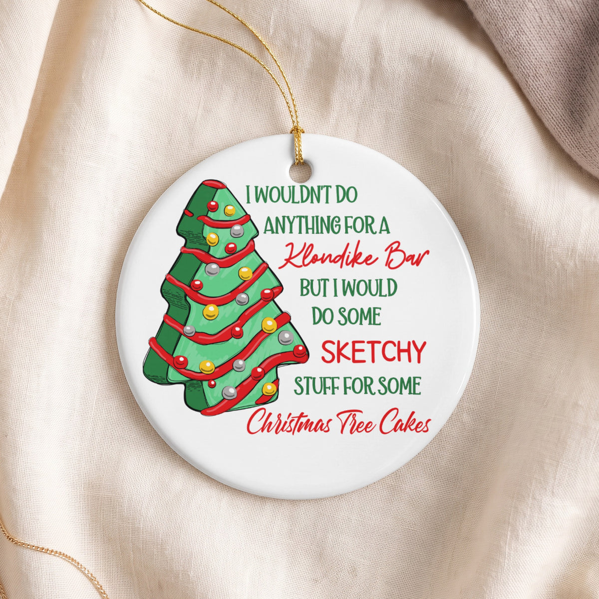Christmas tree ornament with text: "I wouldn't do anything for a Klondike Bar but I would do some sketchy stuff for some Christmas Tree Cakes."