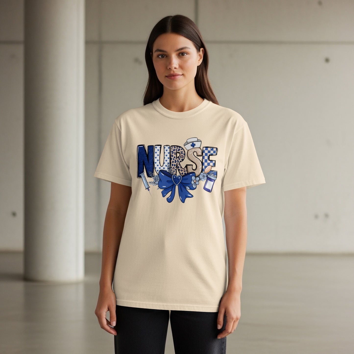 Cream t-shirt with "NURSE" text and medical symbols.
