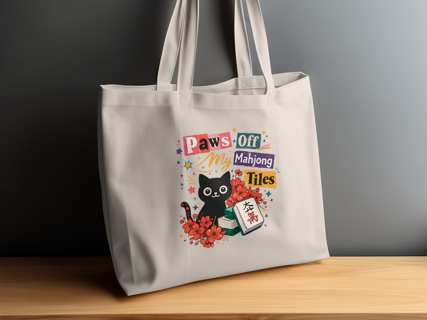 Tote bag with a black cat design stating "Paws Off My Mahjong Tiles."