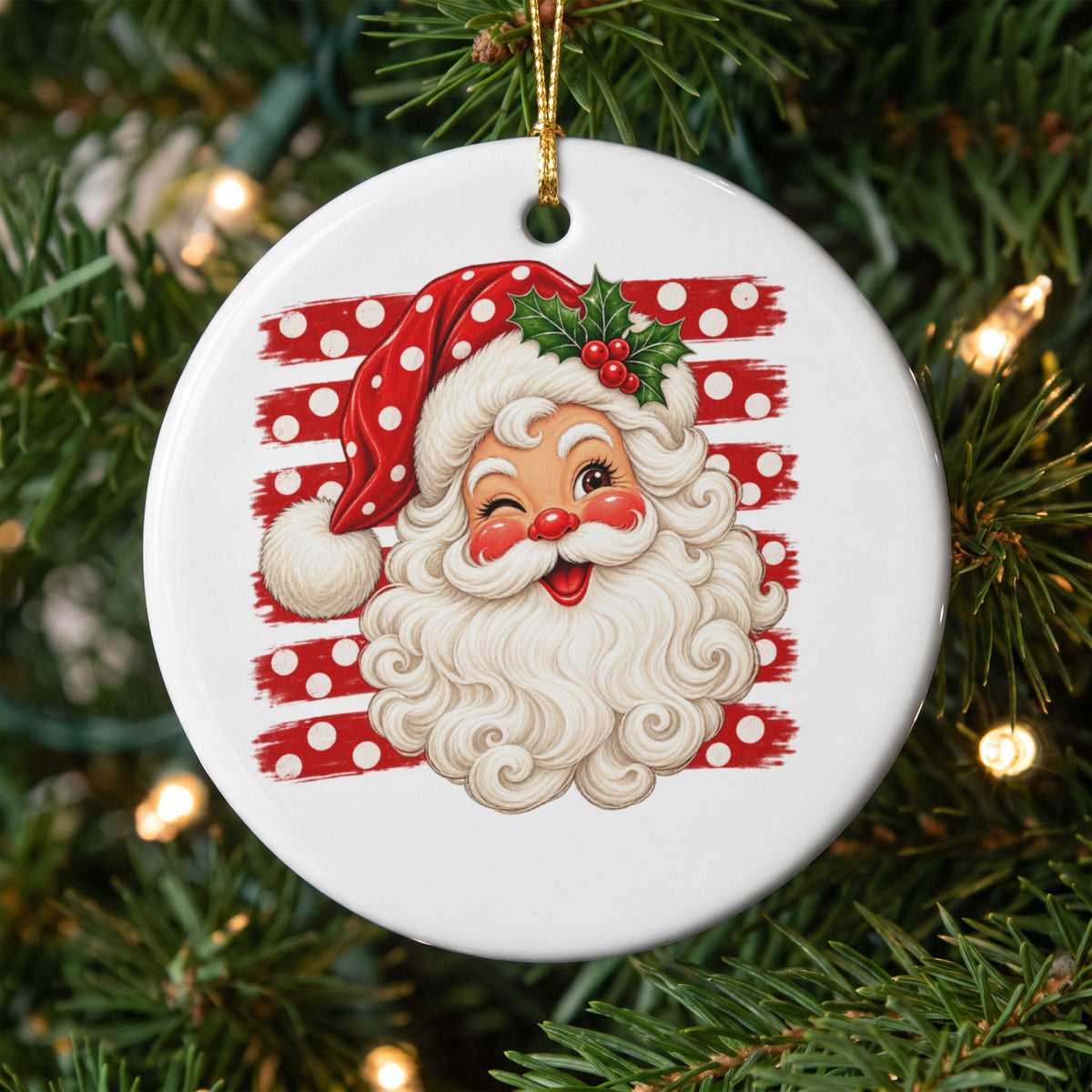 Round ceramic ornament featuring a winking Santa Claus with a red polka dot hat and holly.