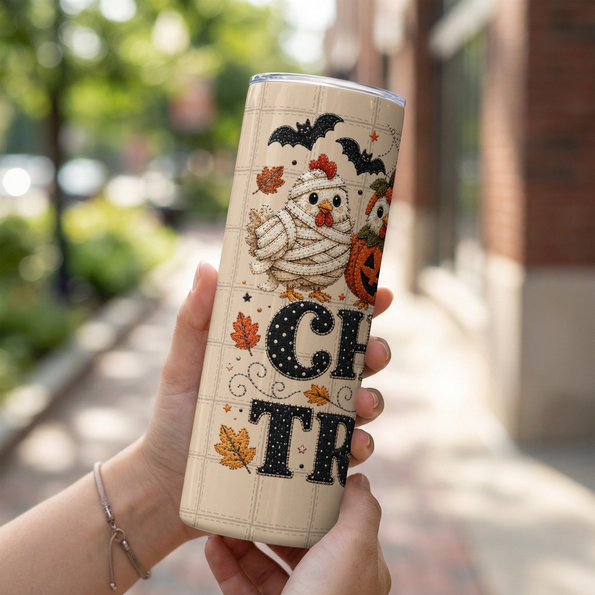 Halloween tumbler featuring a mummy chicken, bats, pumpkin, and "Happy Halloween" text.