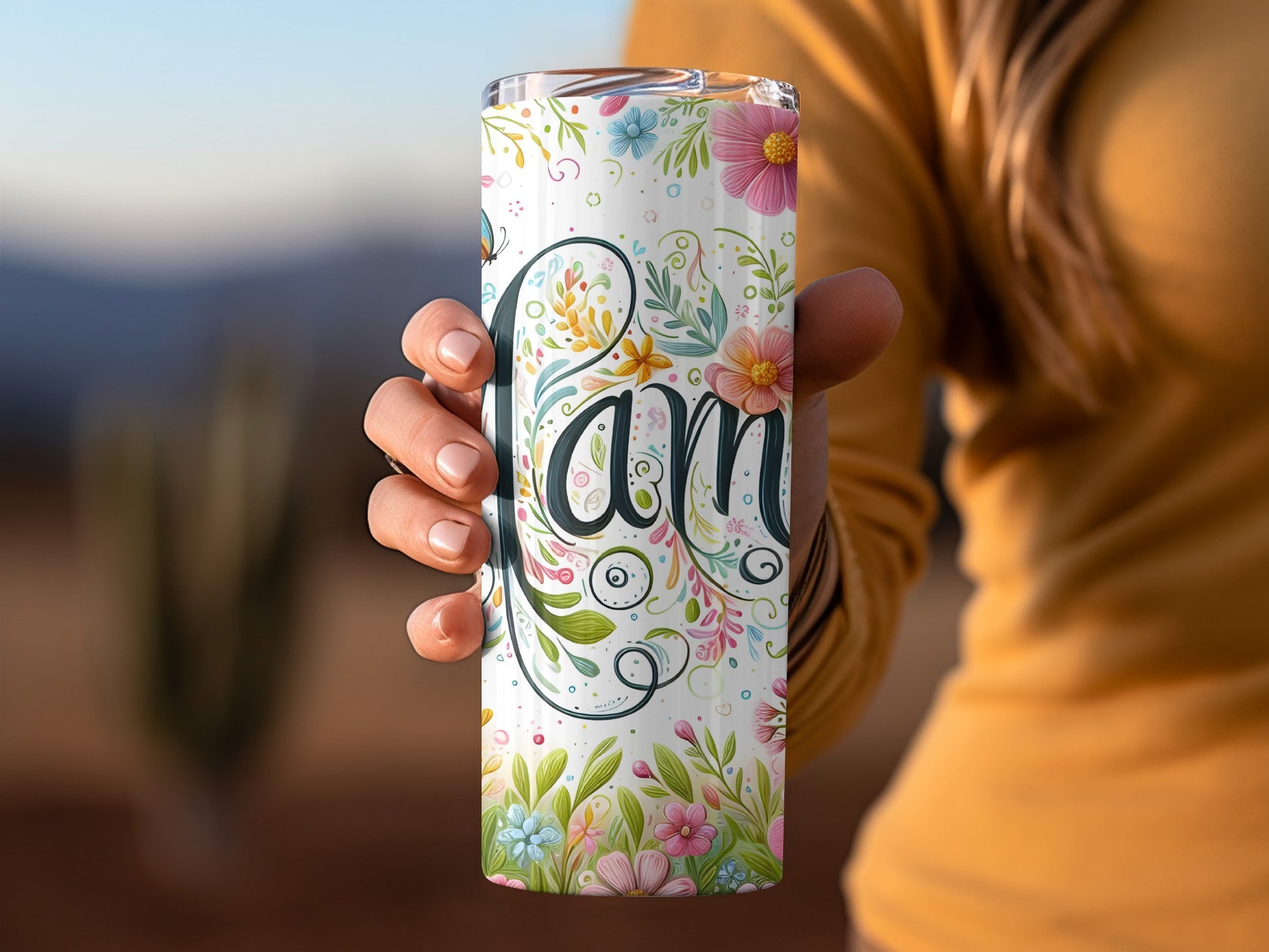 Tumbler with floral pattern and "Mom" in script.