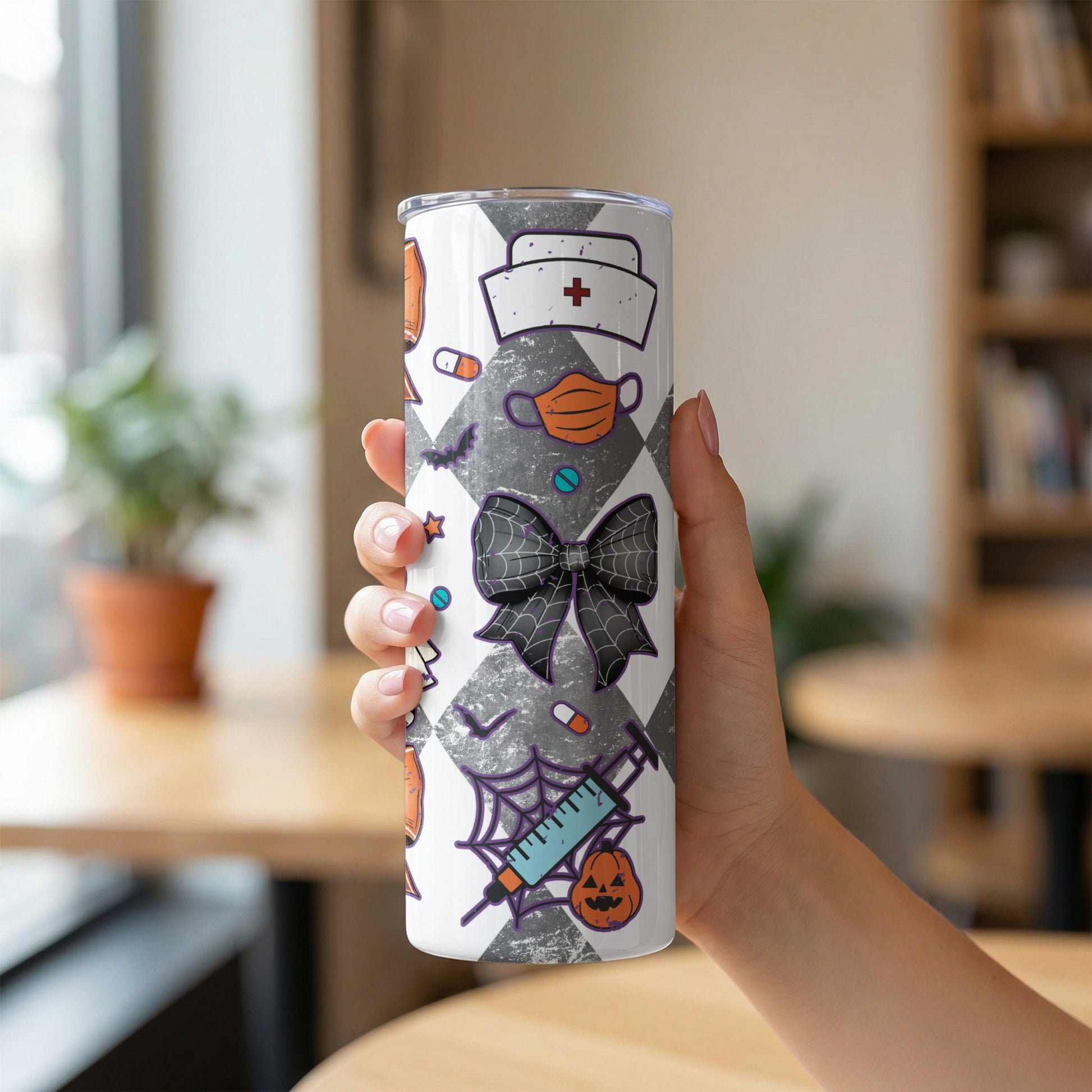 Tumbler with Halloween nurse pattern, featuring bats, masks, pills, and pumpkins.