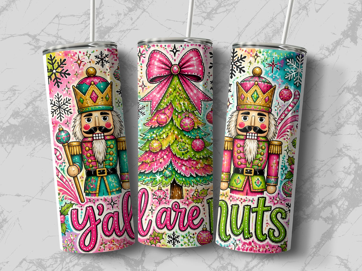 Three tall tumblers display watercolor nutcrackers and a Christmas tree with the text yall are nuts.