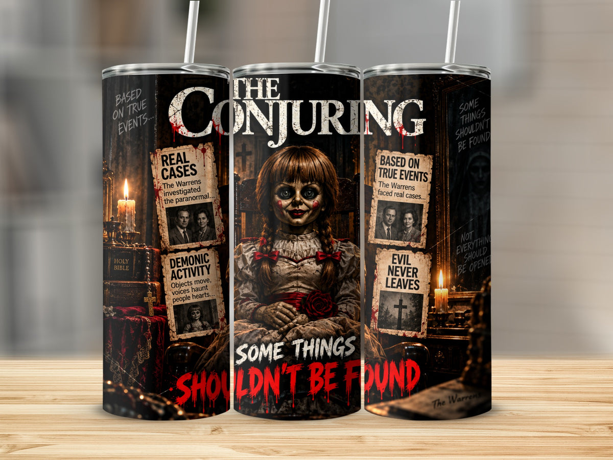 Three metal tumblers display a horror-themed design featuring Annabelle the doll and text from The Conjuring.