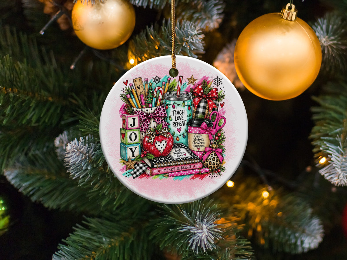 Round ornament with teacher-themed Christmas art: "Teach Love Repeat."