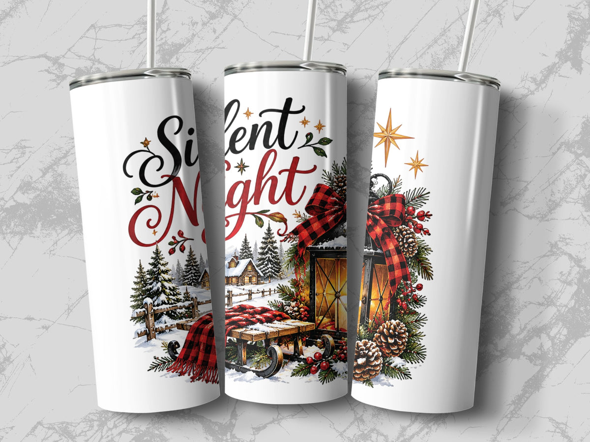 Three white tumblers with straws feature a Silent Night Christmas design with a snow-covered village and lantern.