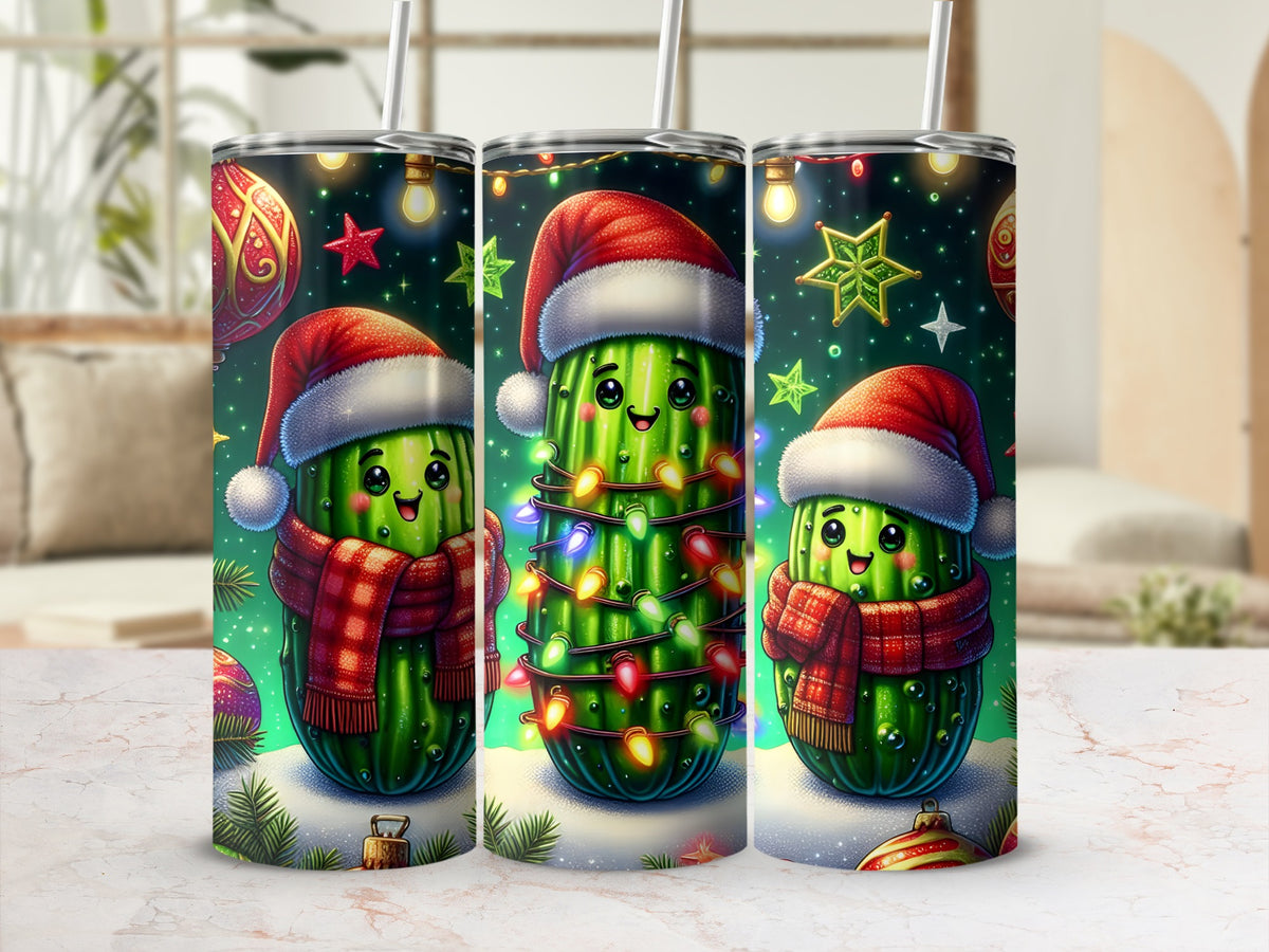 Three metal tumblers display a Christmas pickle design with smiling pickles in Santa hats and scarves.
