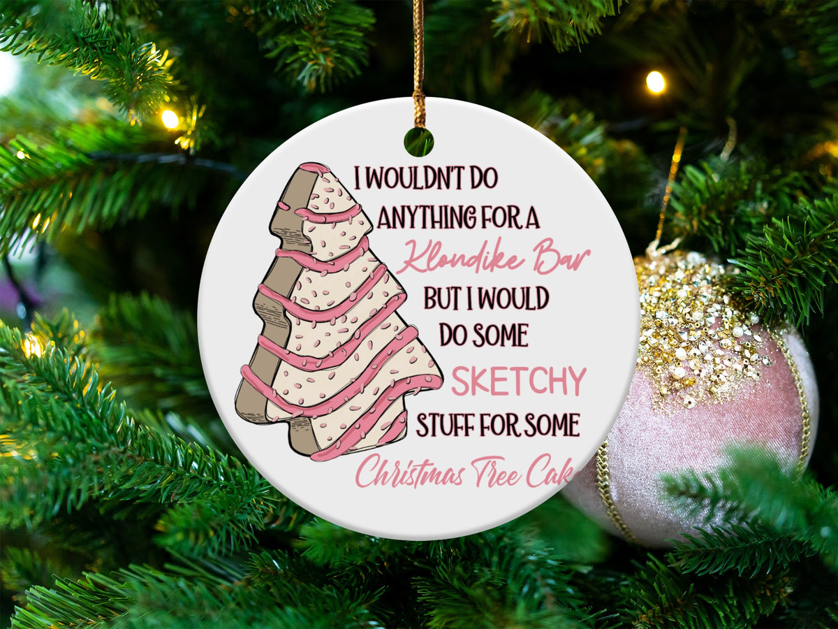 Ornament with tree cookie, saying "I wouldn't do anything for a Klondike Bar but I would do some sketchy stuff for some Christmas tree cake."