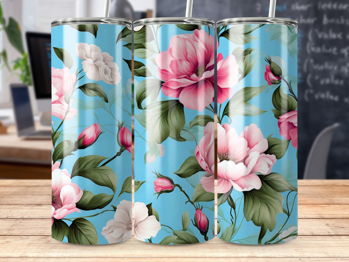 Floral tumbler with pink peonies and green leaves on blue background.