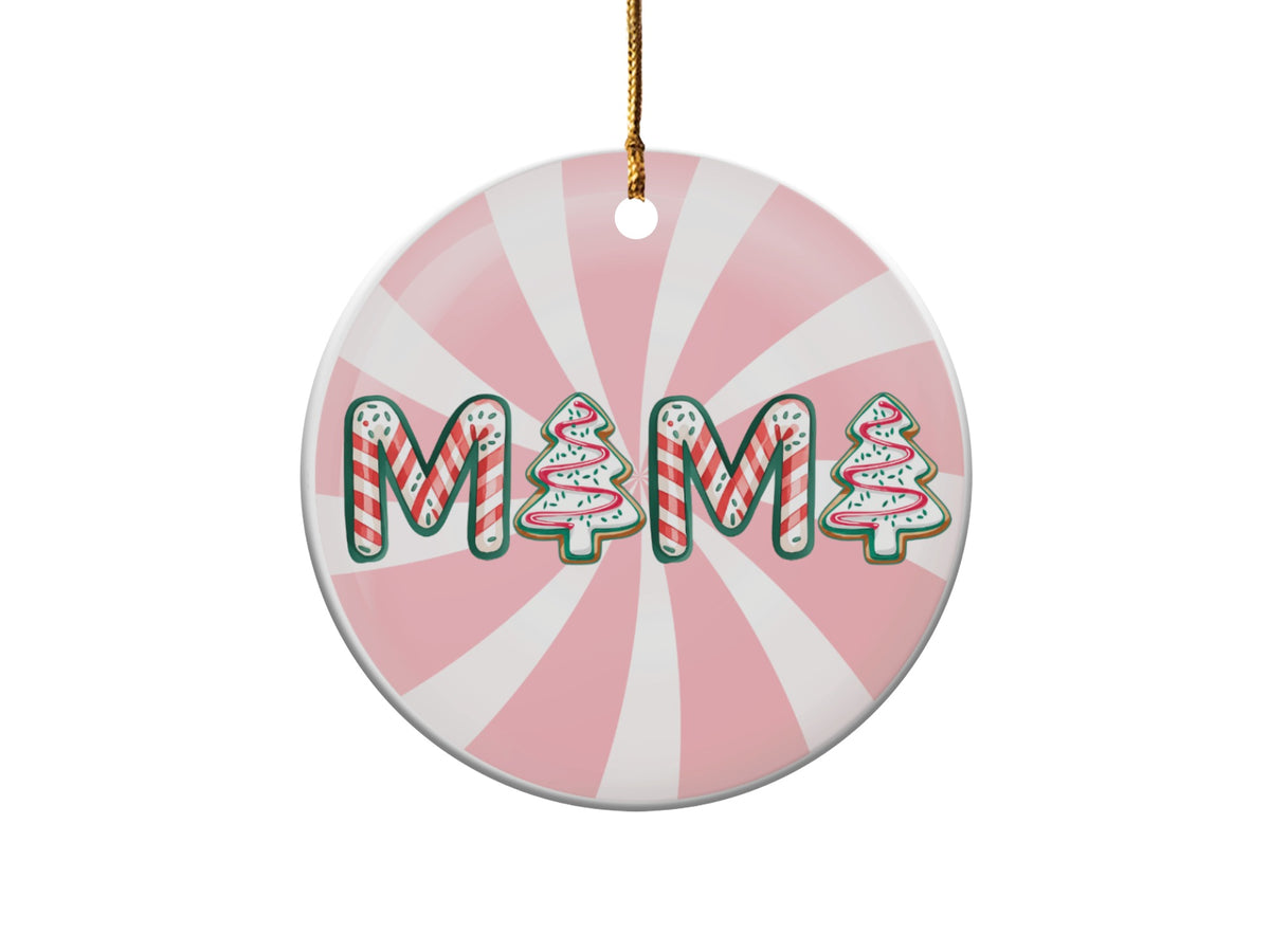 Round ornament with "MAMA" in gingerbread cookie letters on a pink striped background.