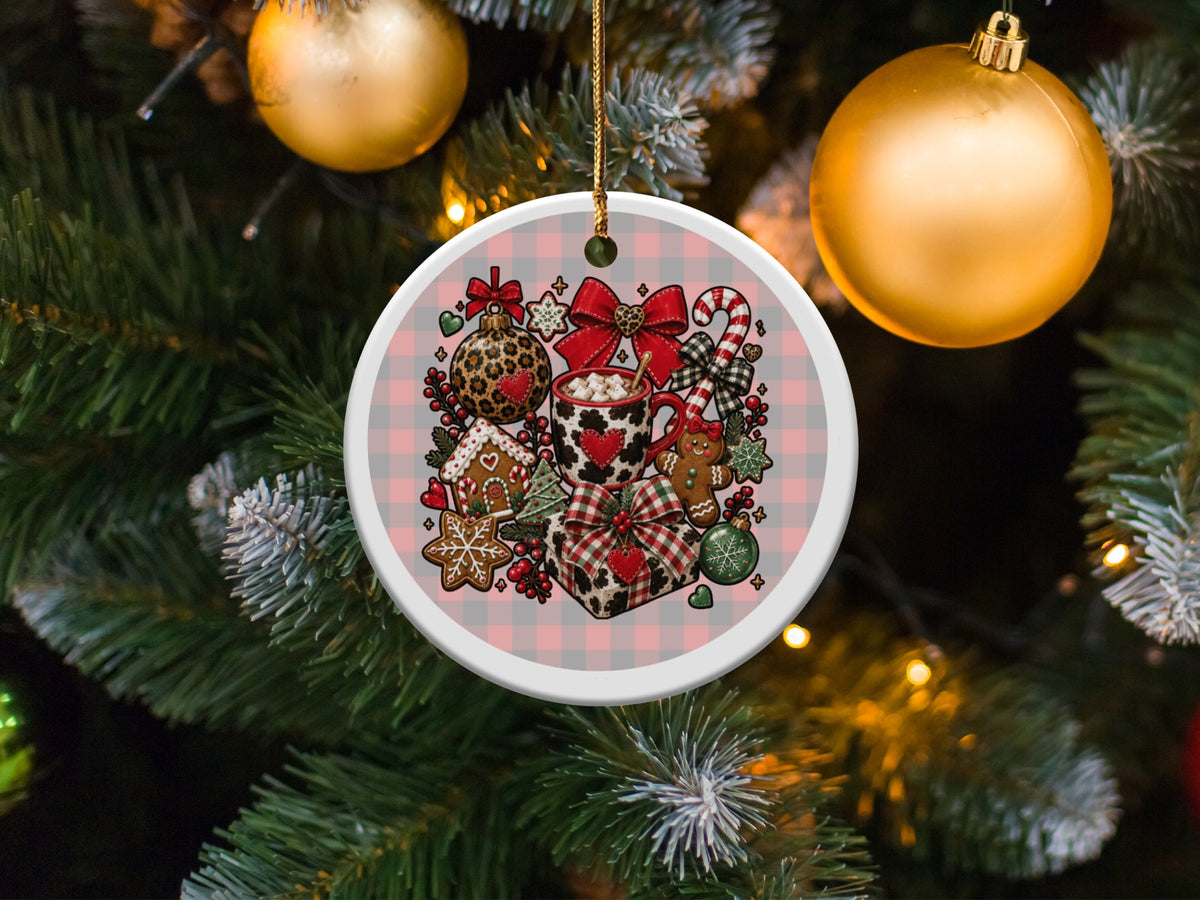 Christmas ornament with gingerbread, mug, bows, and leopard print ball on plaid.