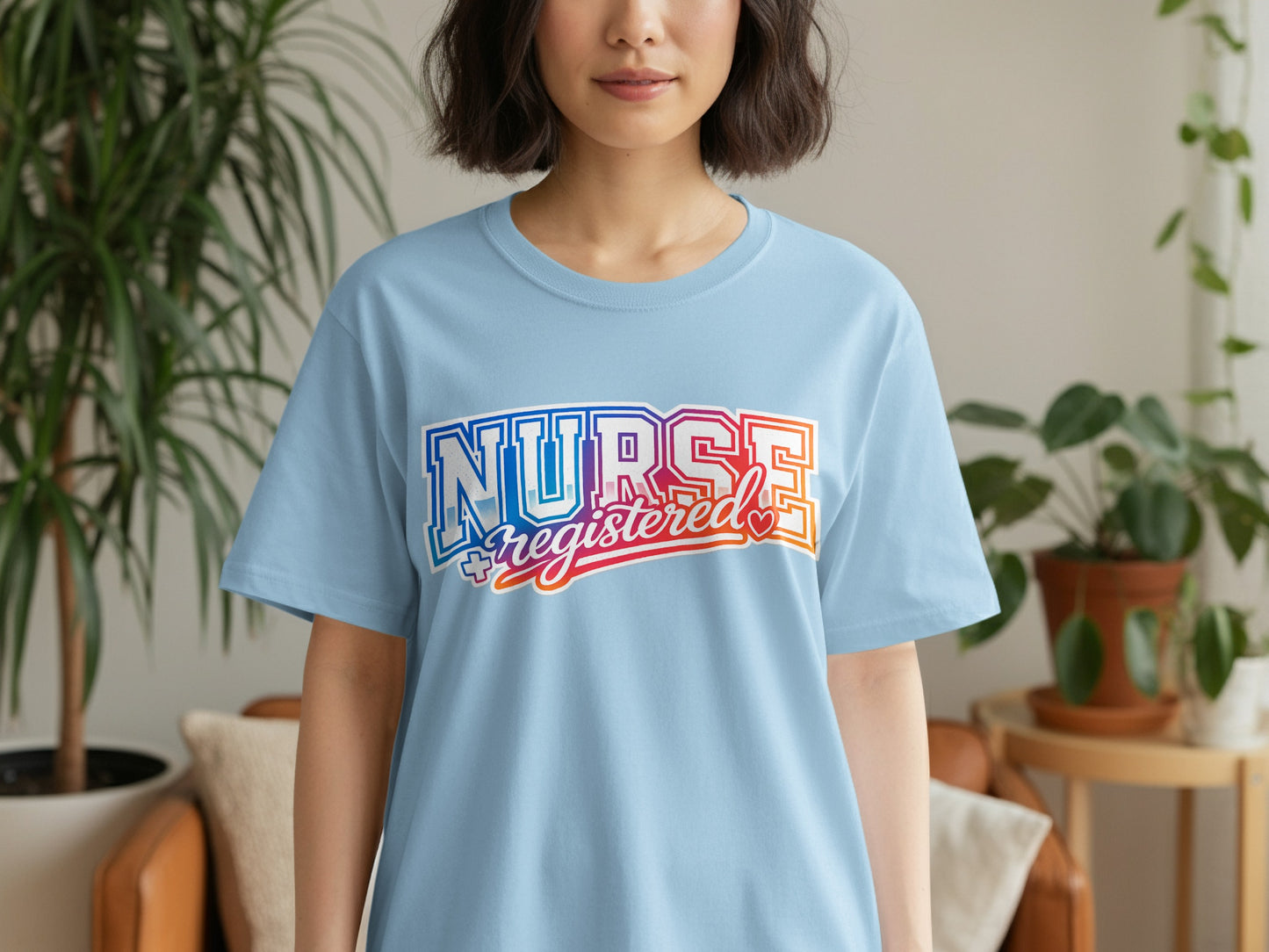 Light blue t-shirt with "Nurse Registered" in colorful text.