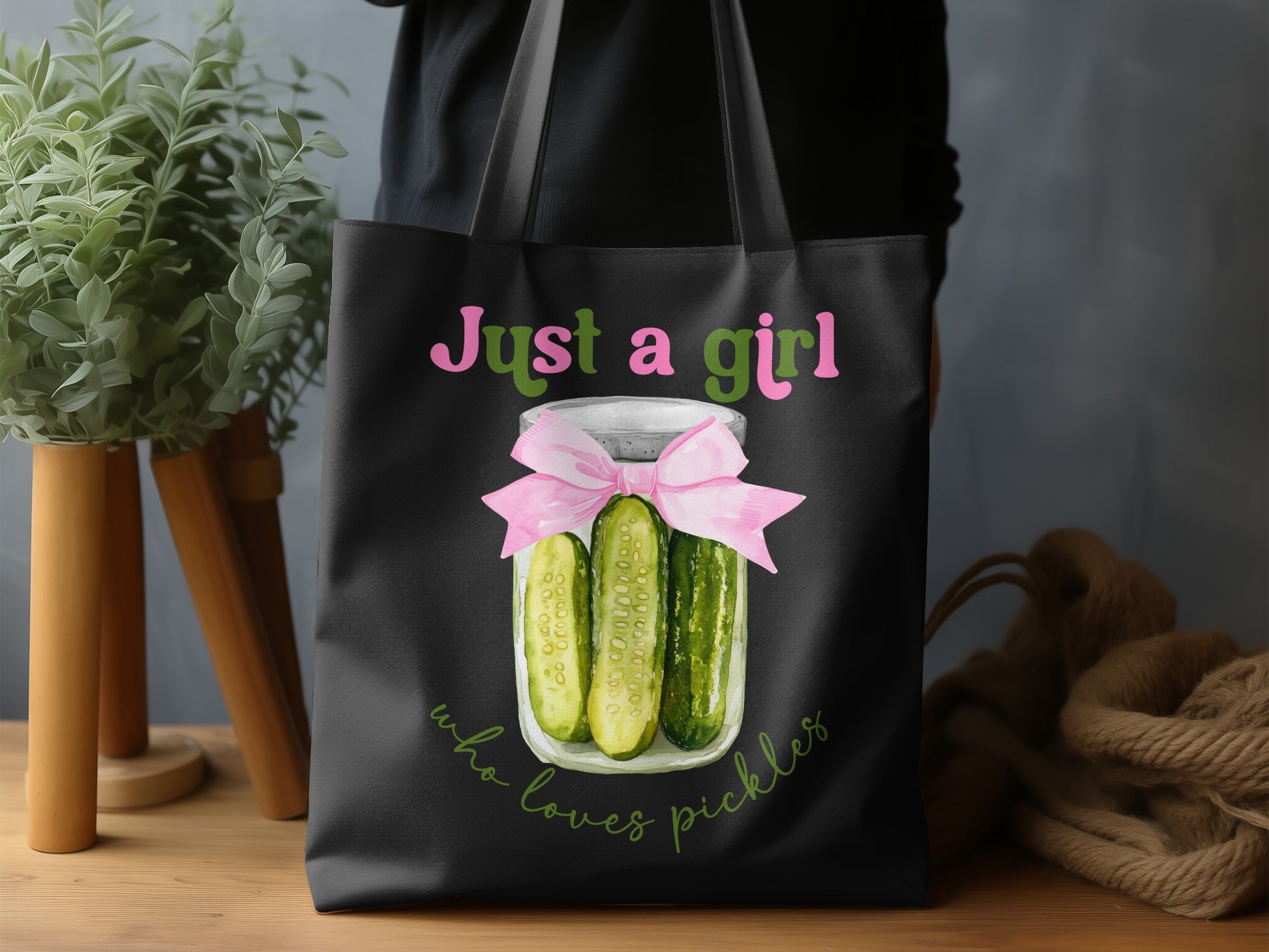 Tote bag with "Just a girl who loves pickles" text and pickle jar illustration.