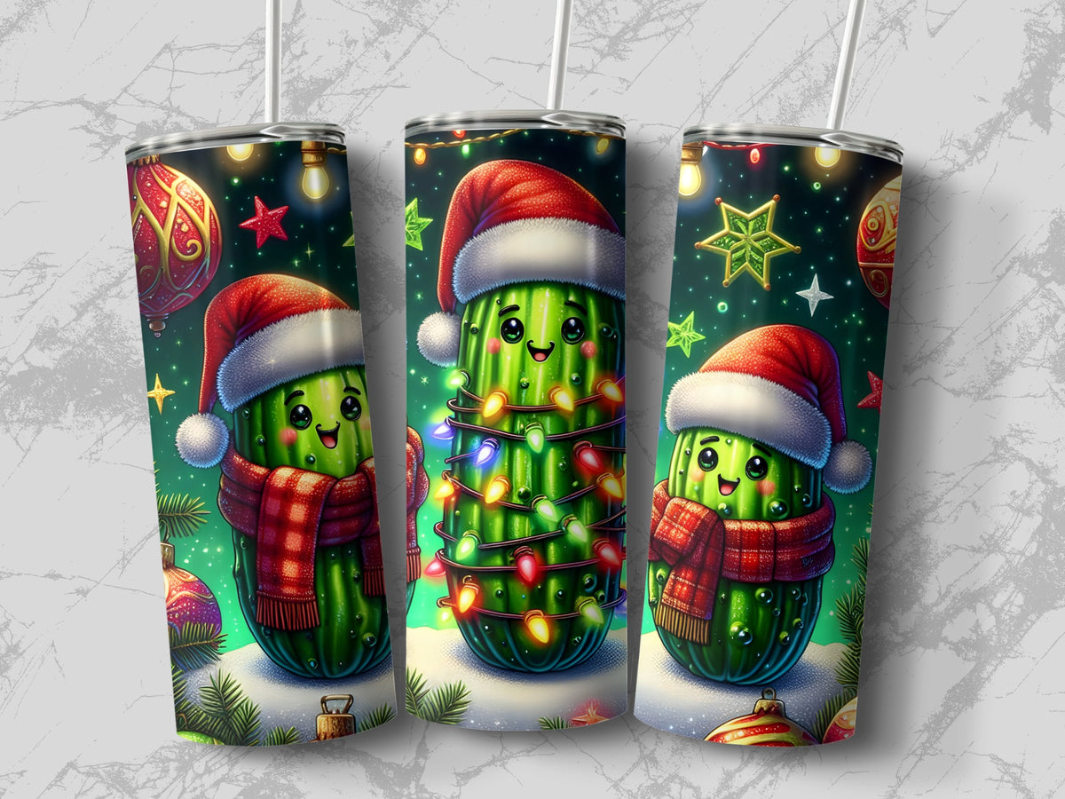 Three cylindrical tumblers with straws, featuring a Christmas pickle wearing a Santa hat and scarf, surrounded by holiday lights.