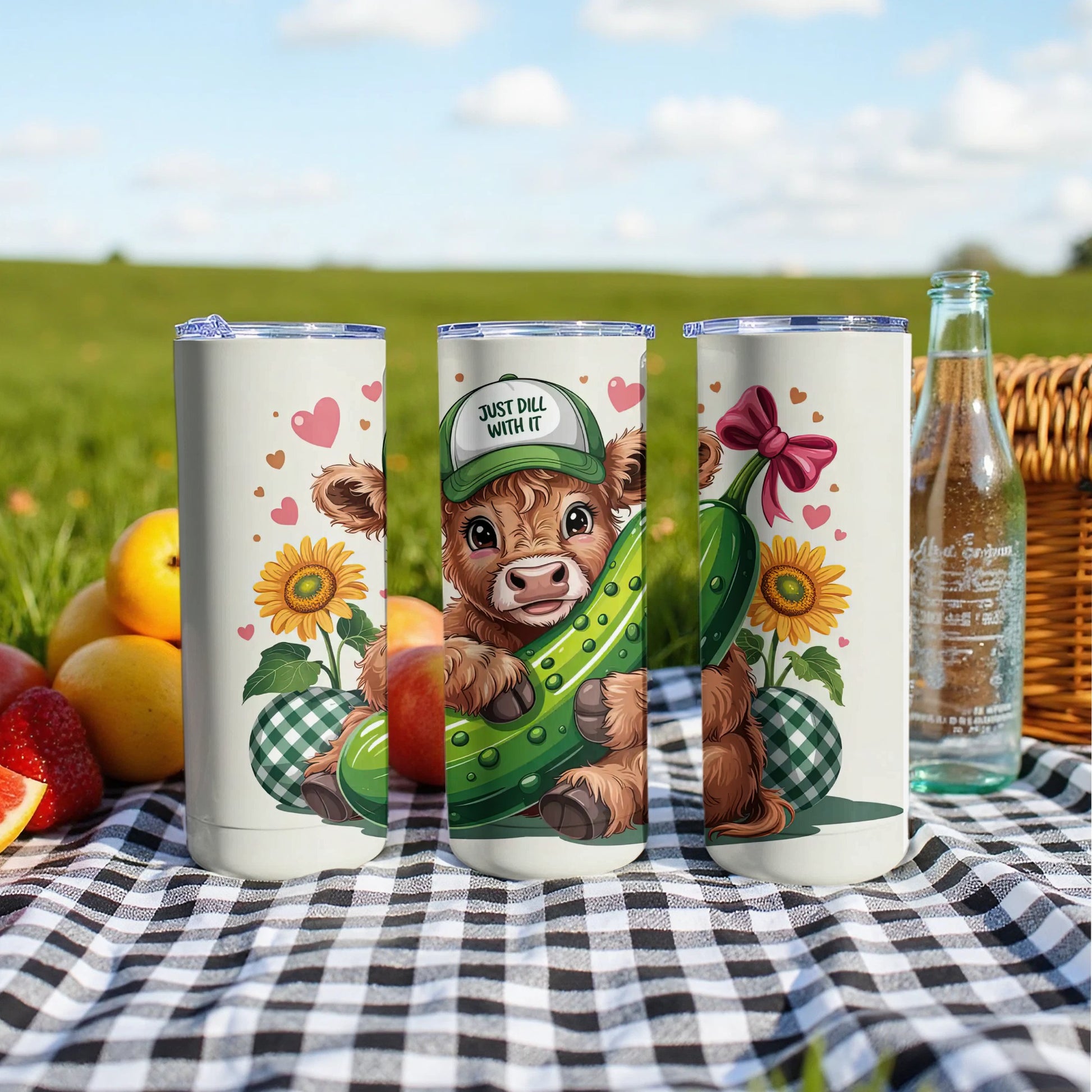 Cow in green hat with pickle and sunflower design on tumbler.