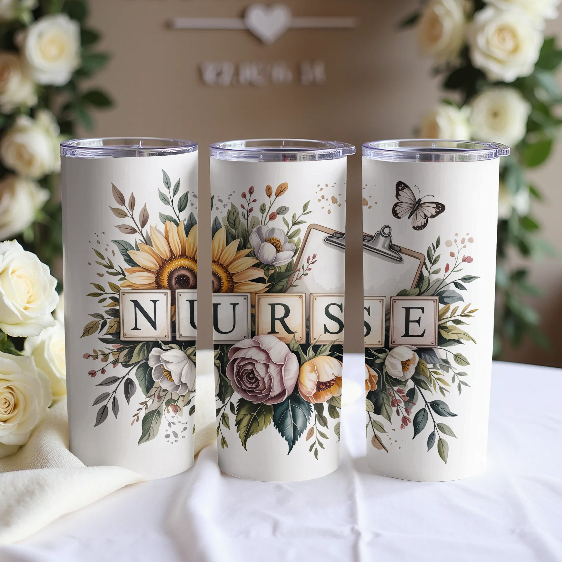 Three tumblers decorated with sunflowers, roses, and the word "NURSE".