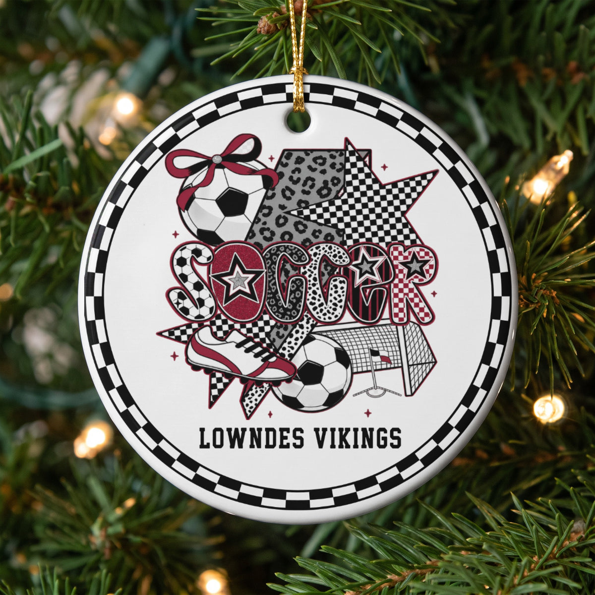 Round Lowndes Vikings soccer ornament with checkered border and patterned text.