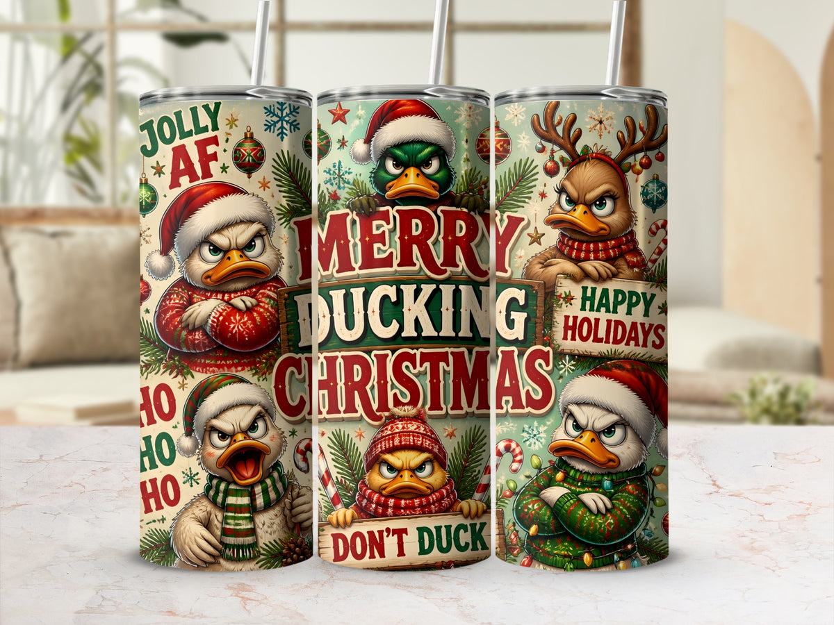 Three insulated tumblers display humorous cartoon ducks in festive winter gear with the text Merry Ducking Christmas.