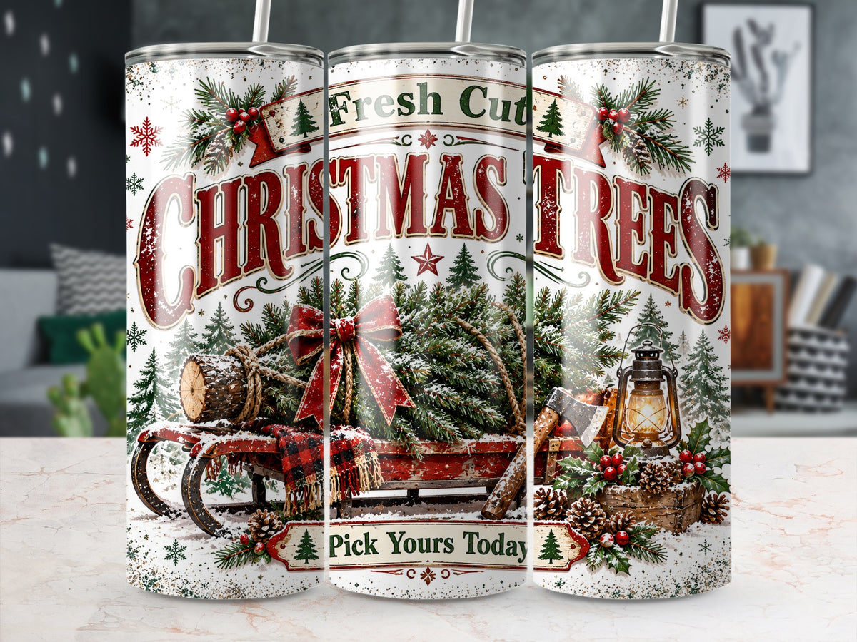 Three tall tumblers display a vintage Christmas tree design with a red sled, lantern, and pine branches.