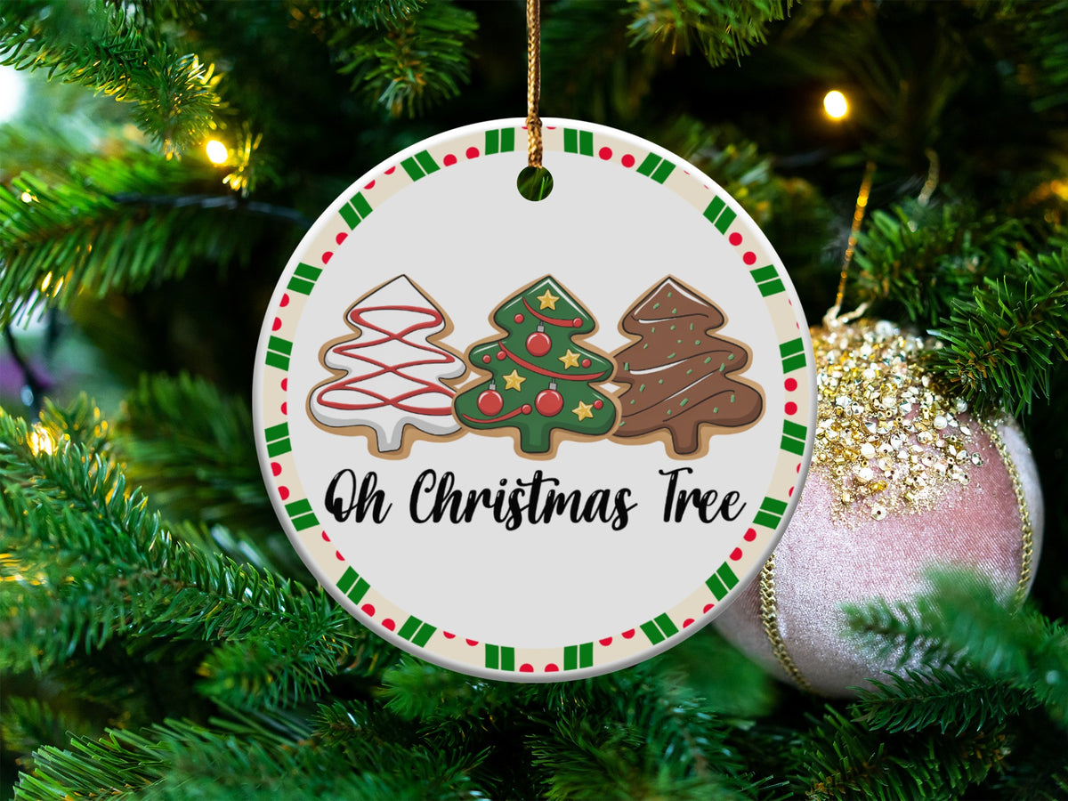Round ornament with three decorated Christmas trees and text "Oh Christmas Tree."