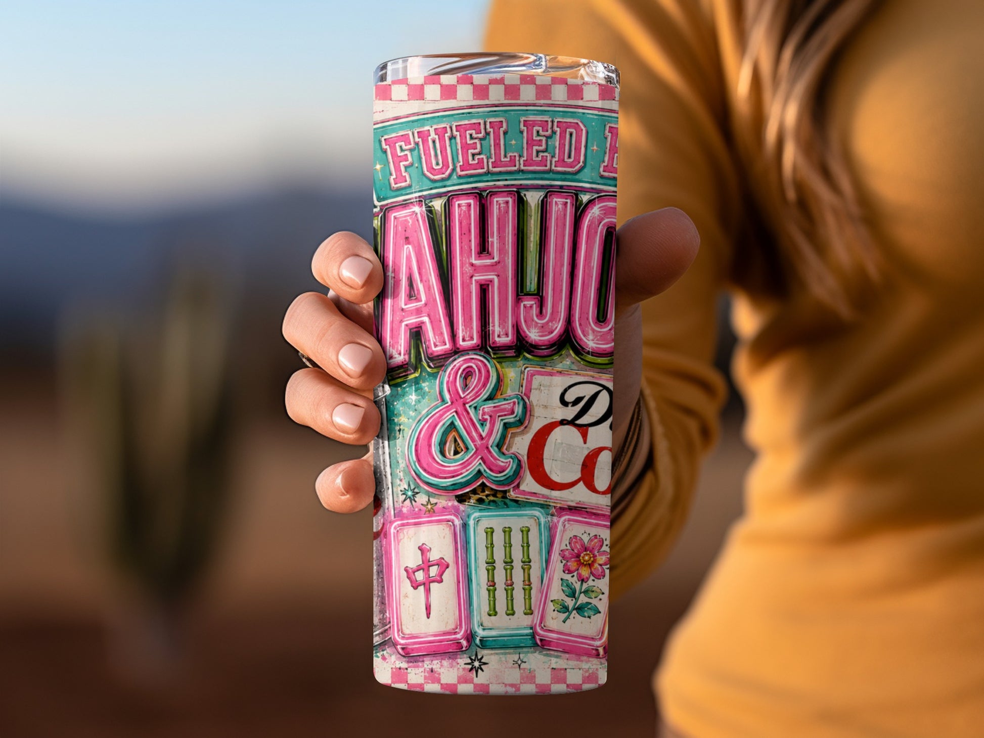 Tumbler with "Fueled by Mahjong & Coffee" text, tiles, and flower design.