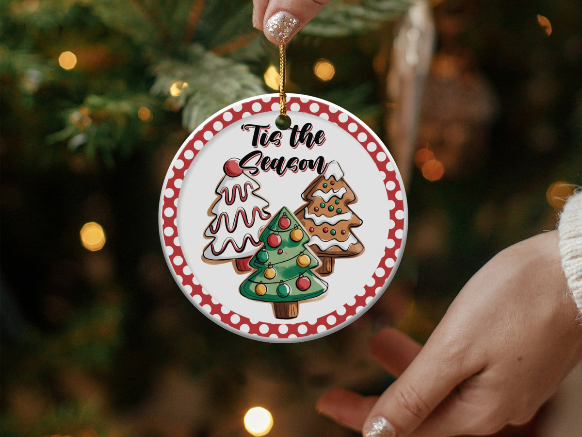 Round ornament with three decorated Christmas trees and "Tis the Season" text.