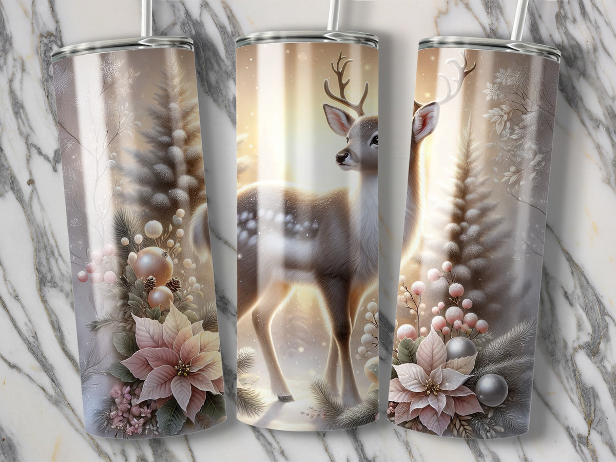 Three metal tumblers display a winter deer design featuring snowy pine trees, poinsettias, and ornaments.