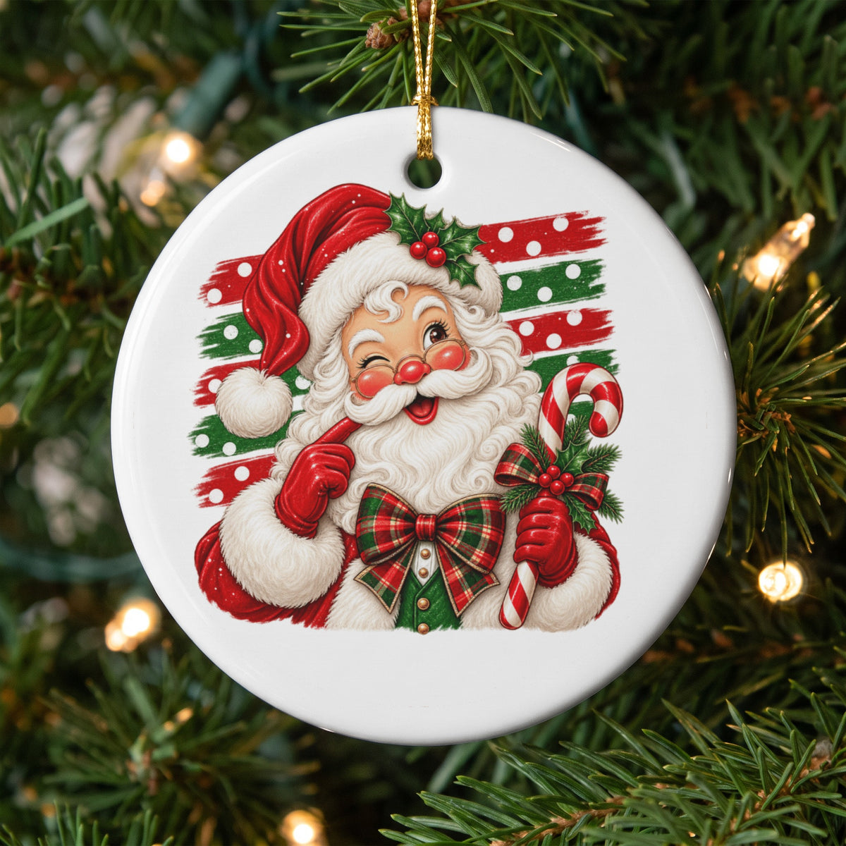 Round Christmas ornament featuring a winking Santa Claus holding a candy cane.
