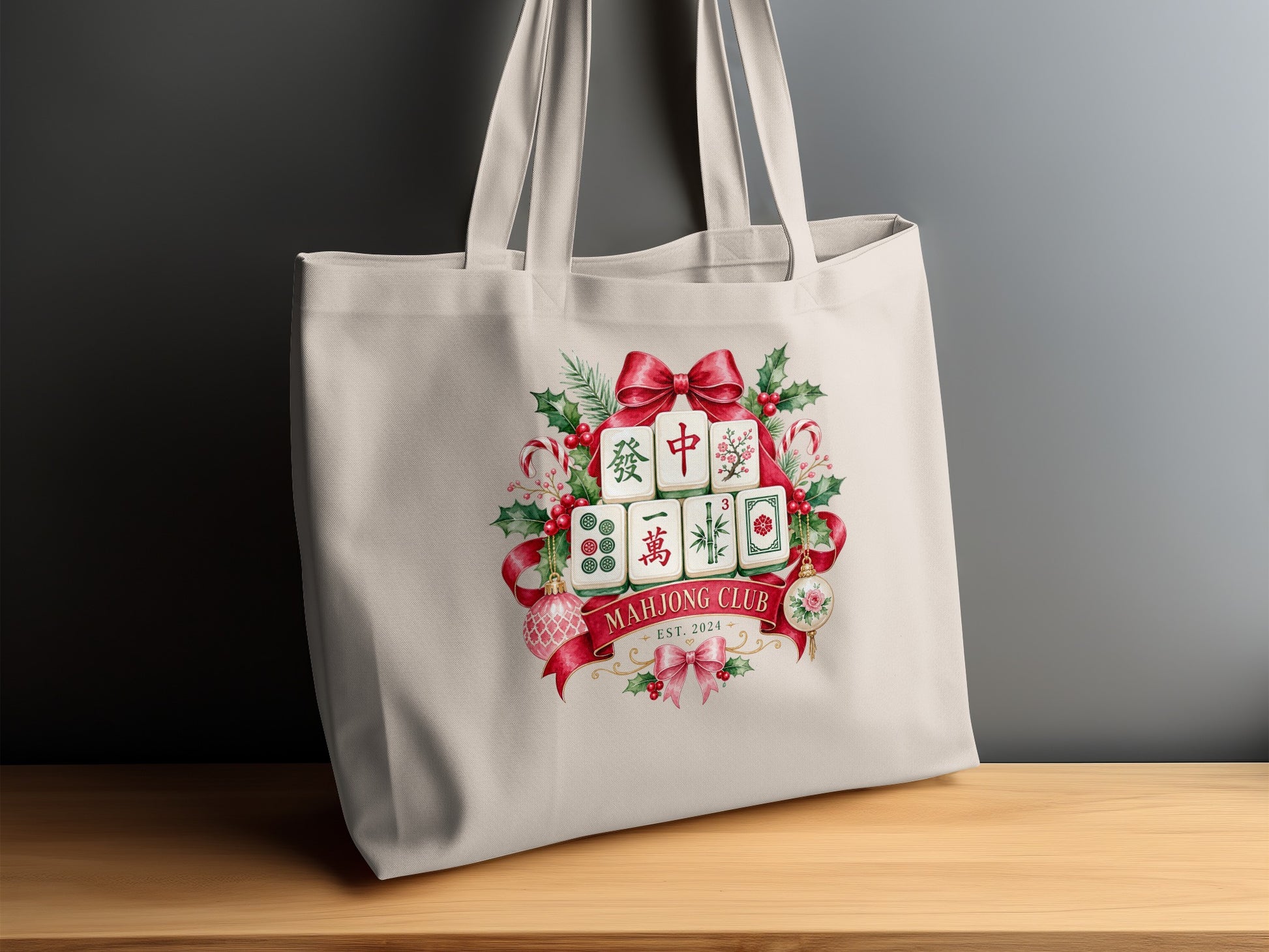 Tote bag with Mahjong tiles, holiday wreath, and "Mahjong Club Est. 2024" text.