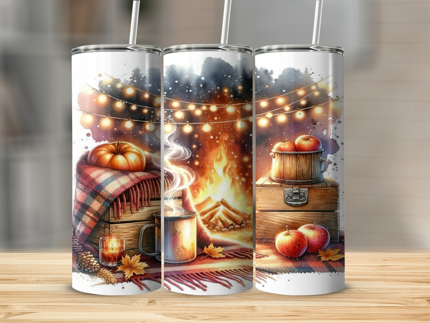 Tumblers with autumn theme: pumpkin, campfire, apples, and string lights.