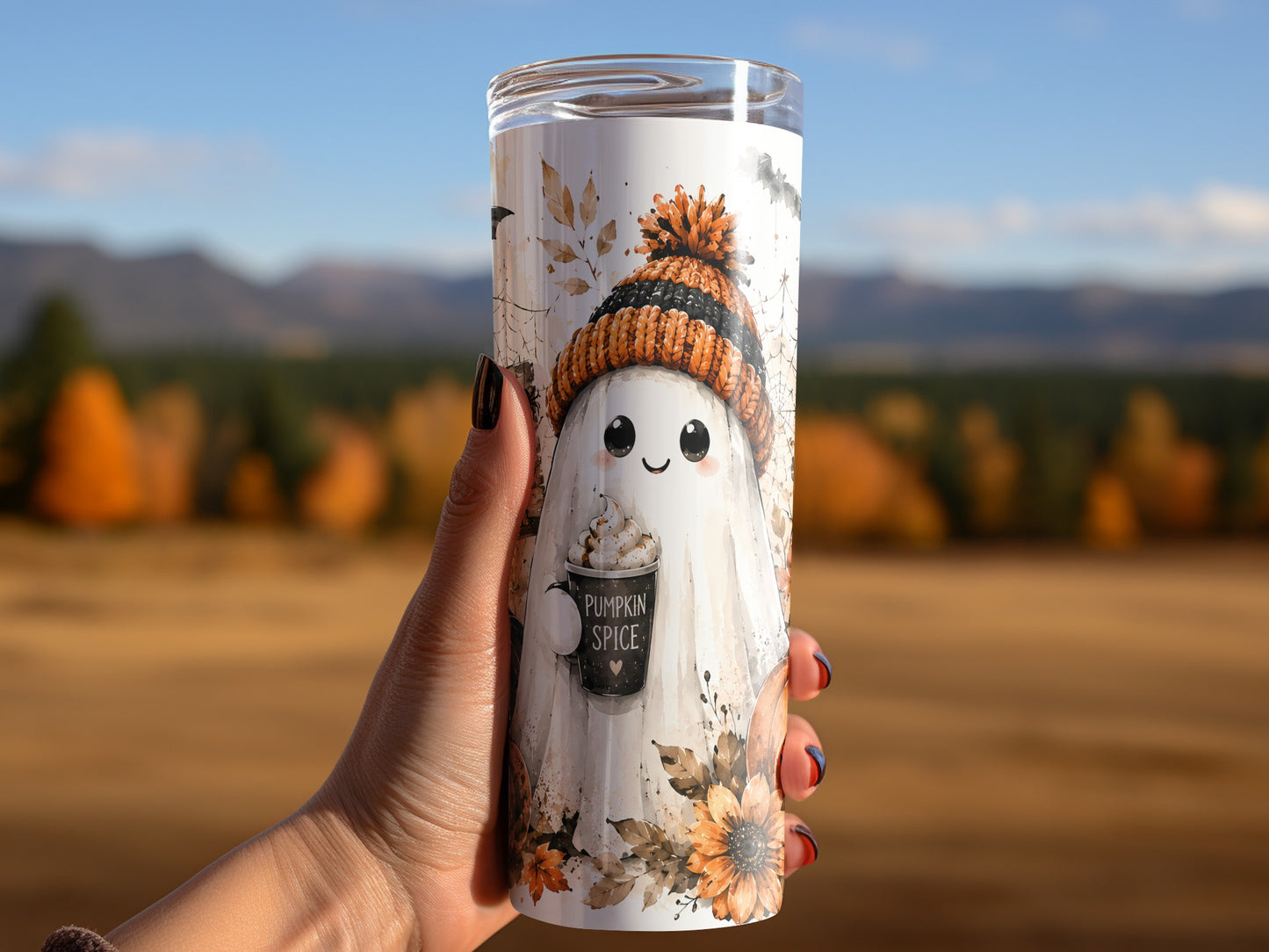 Tumbler with ghost wearing a beanie holding a "Pumpkin Spice" coffee cup.