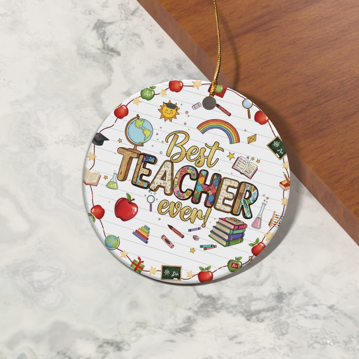 Round ornament with "Best Teacher ever!" text and school-themed icons.