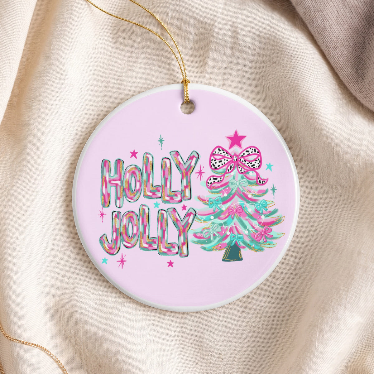 Round ornament with "Holly Jolly" text and a decorated Christmas tree.