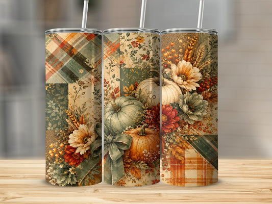 Three tumblers with autumnal patchwork designs featuring pumpkins, flowers, and plaid.