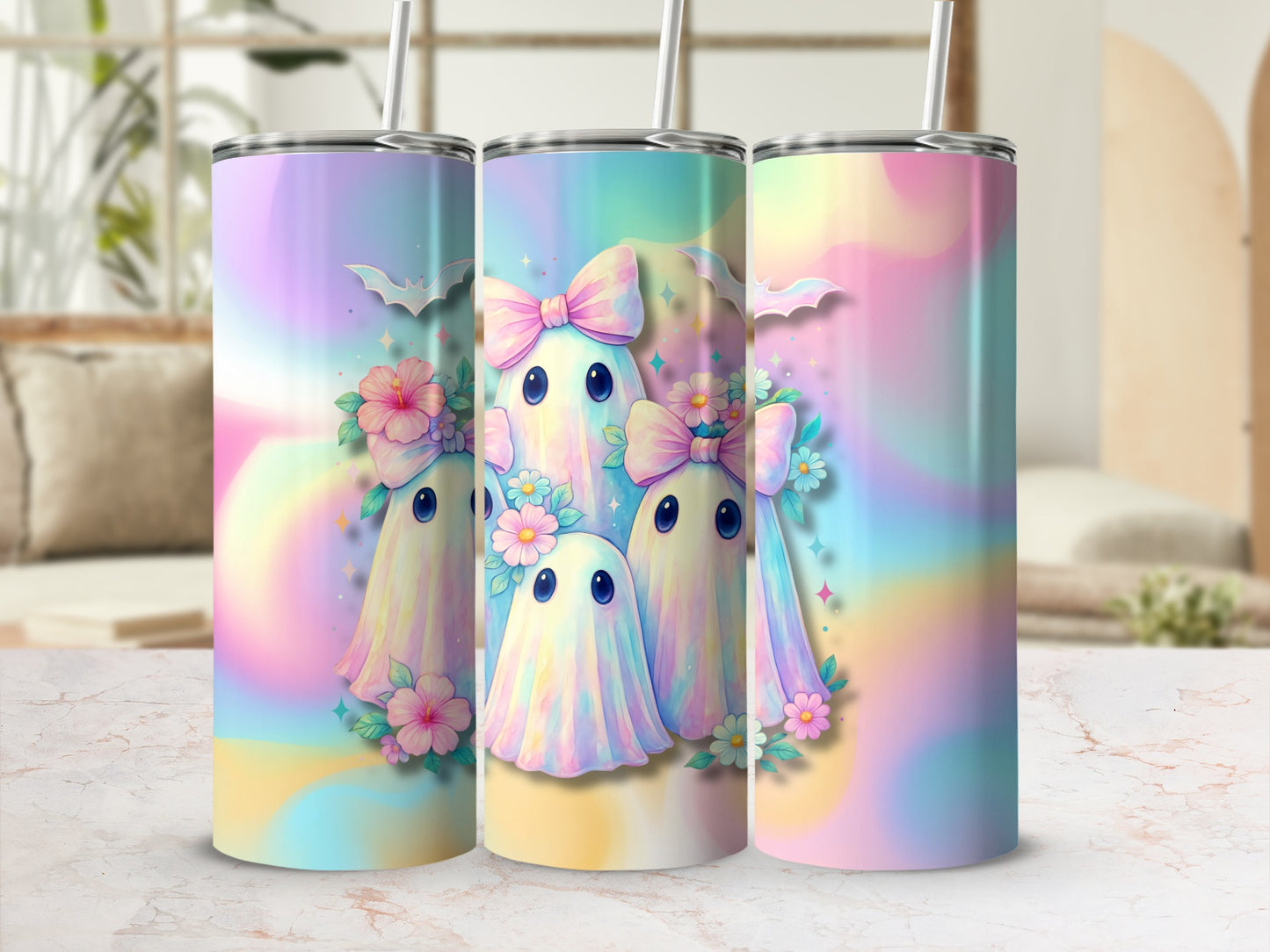 Three tumblers with pastel watercolor ghosts, flowers, and bats.
