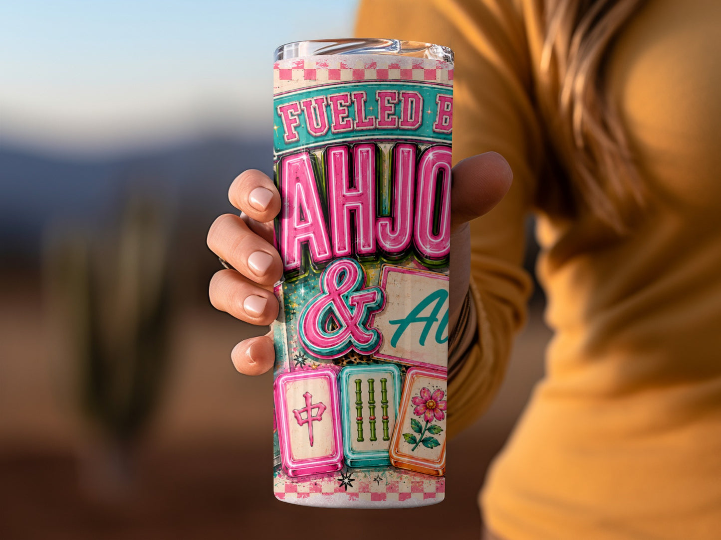 Tumbler with "Fueled by AHJO & AU" and mahjong tiles including bamboo and flower.