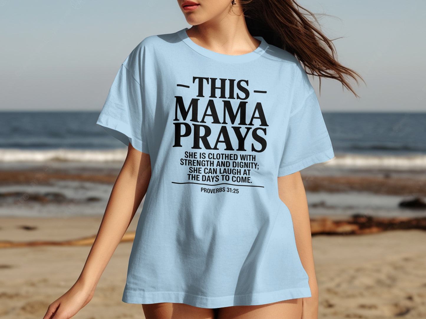 Light blue t-shirt with "THIS MAMA PRAYS" and Proverbs 31:25 quote.