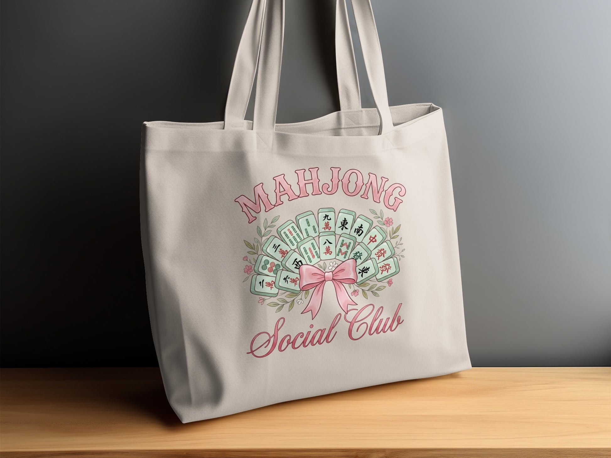 Tote bag with "Mahjong Social Club" text and fan design of mahjong tiles.