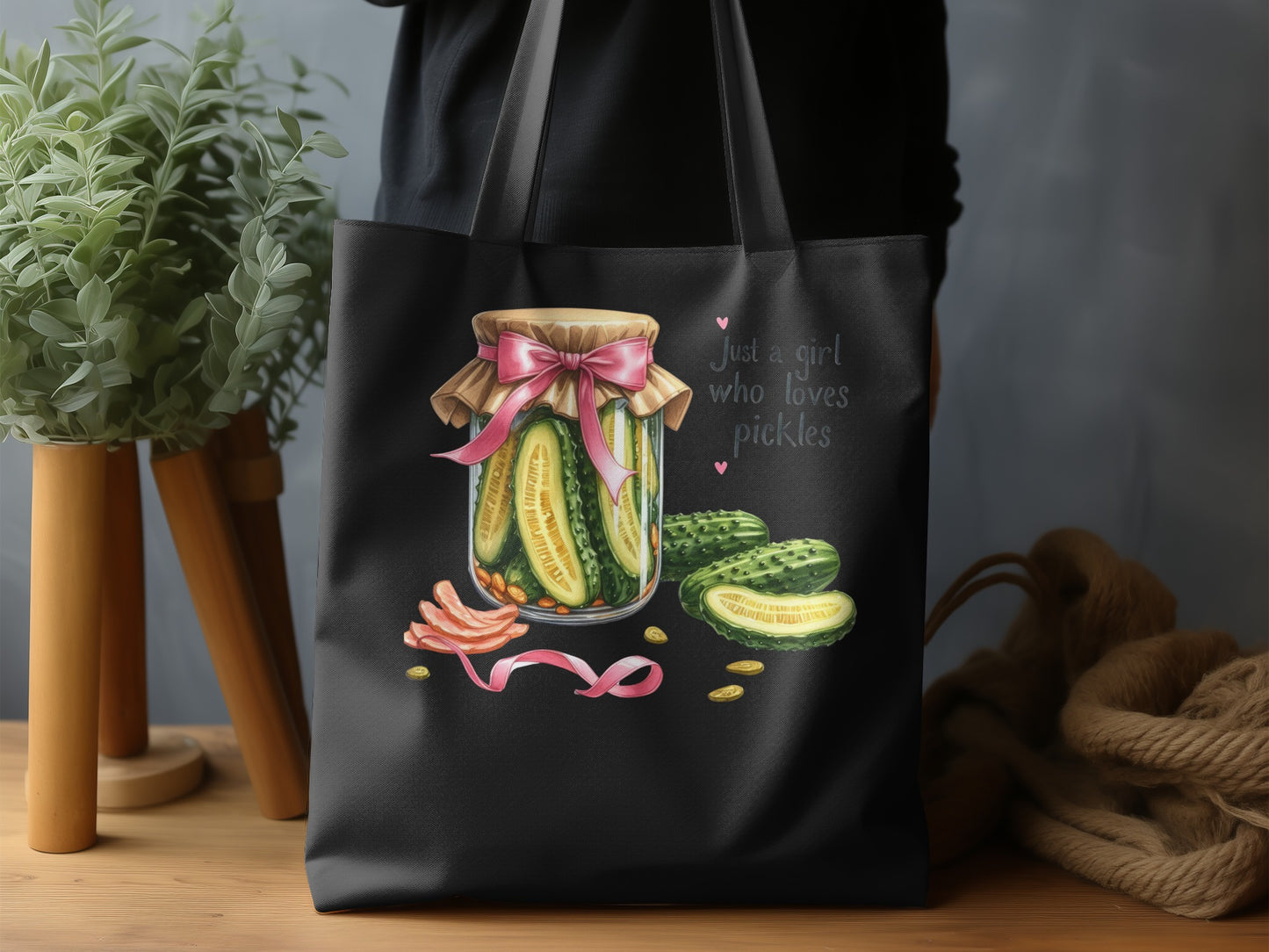 Jar of pickles with pink ribbon and text "Just a girl who loves pickles".