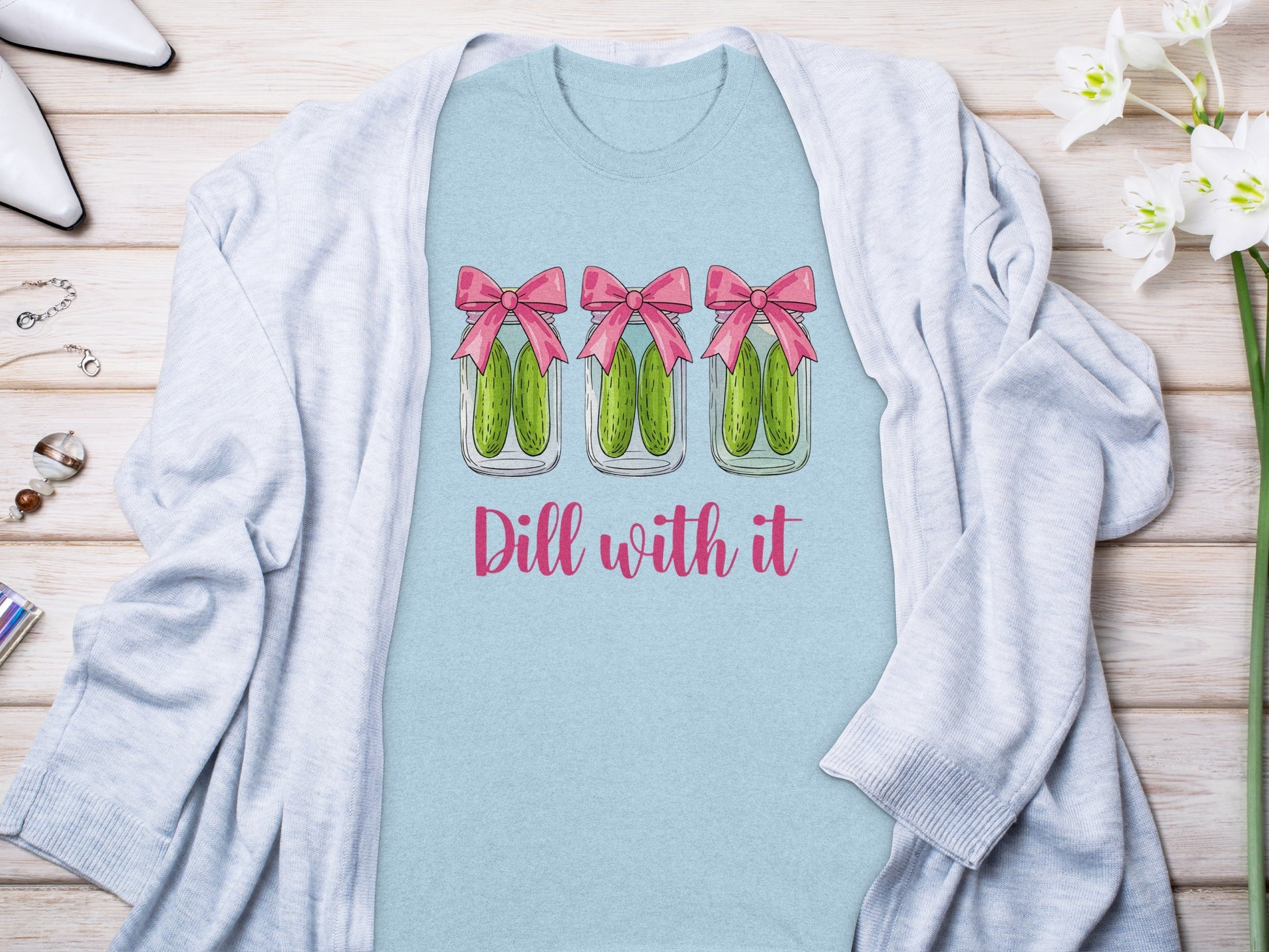 Light blue t-shirt with three jars of pickles and "Dill with it" text.