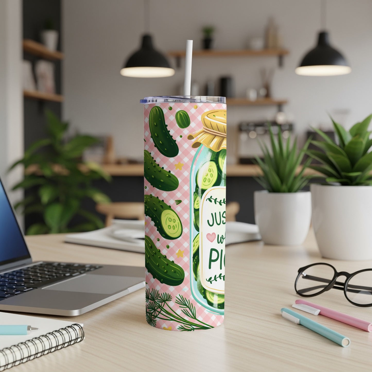 Glass jar with pickles and text "Just Here For The Pickles" on a pink checkered background.