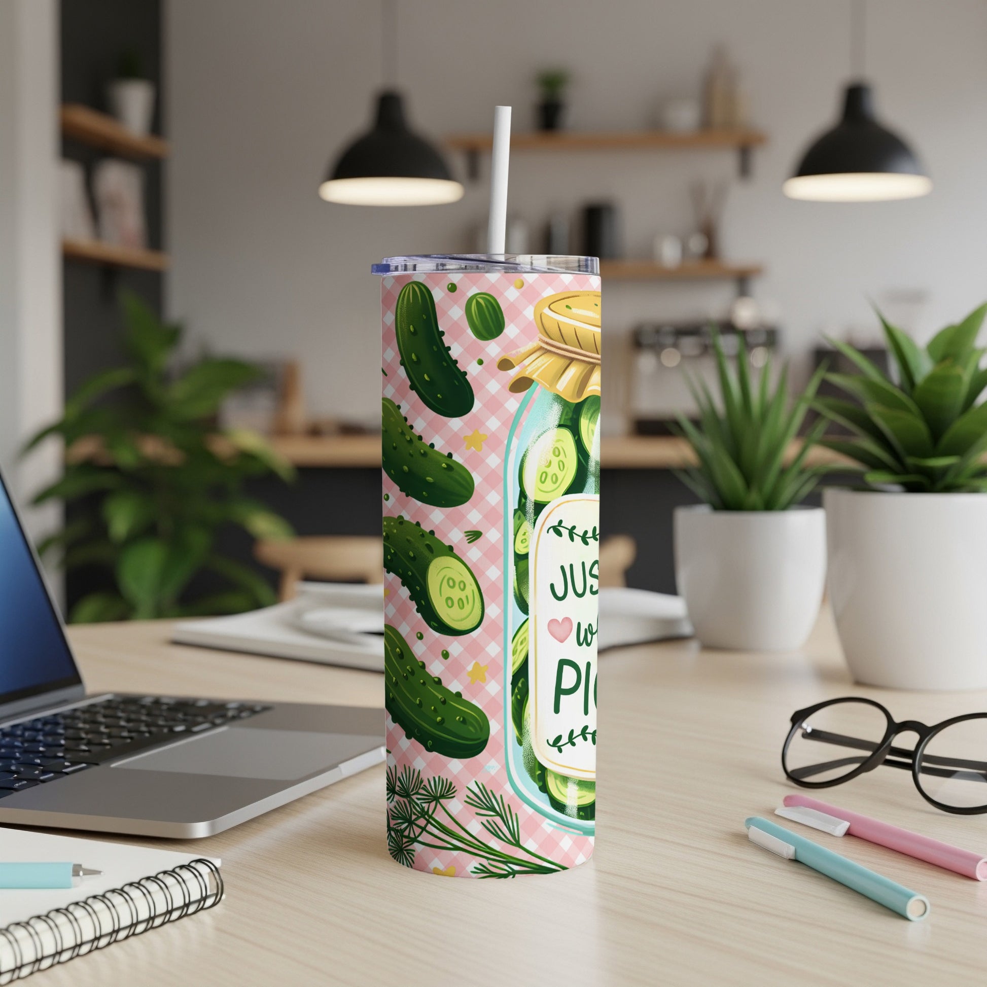 Glass jar with pickles and text "Just Here For The Pickles" on a pink checkered background.