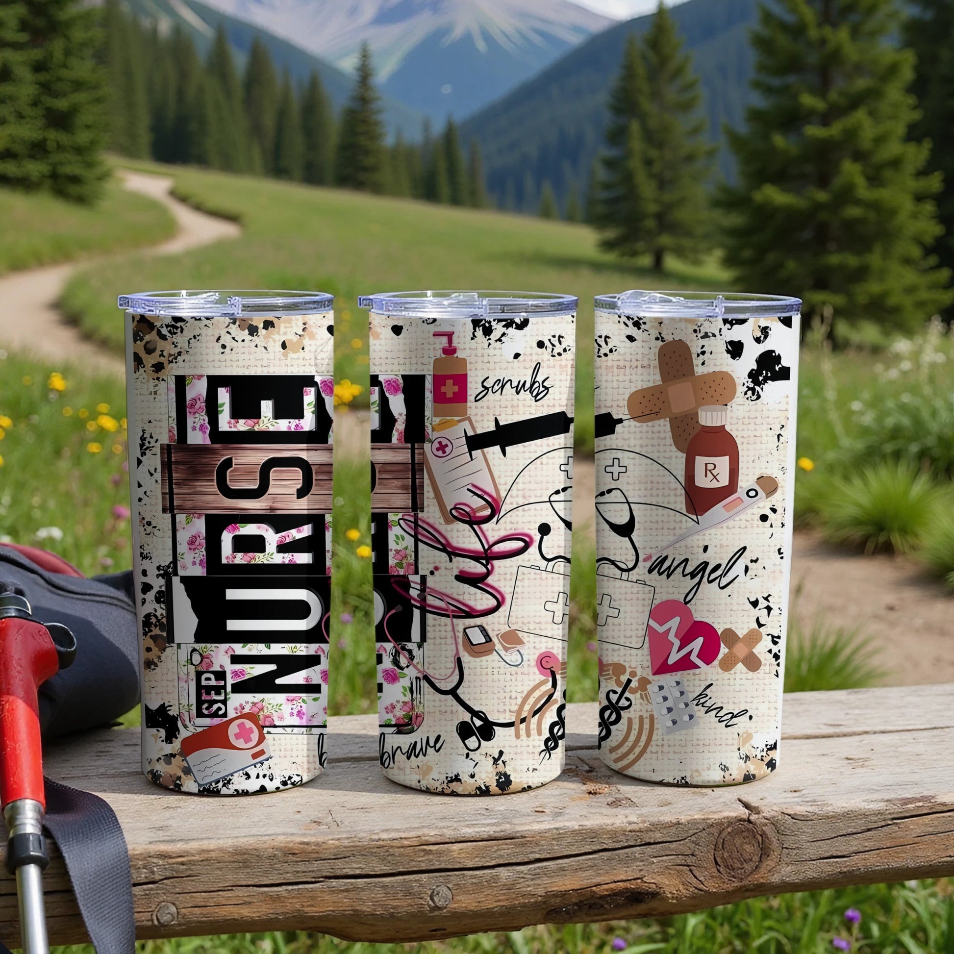 Three tumblers with medical and inspirational nurse-themed designs on a wooden table.
