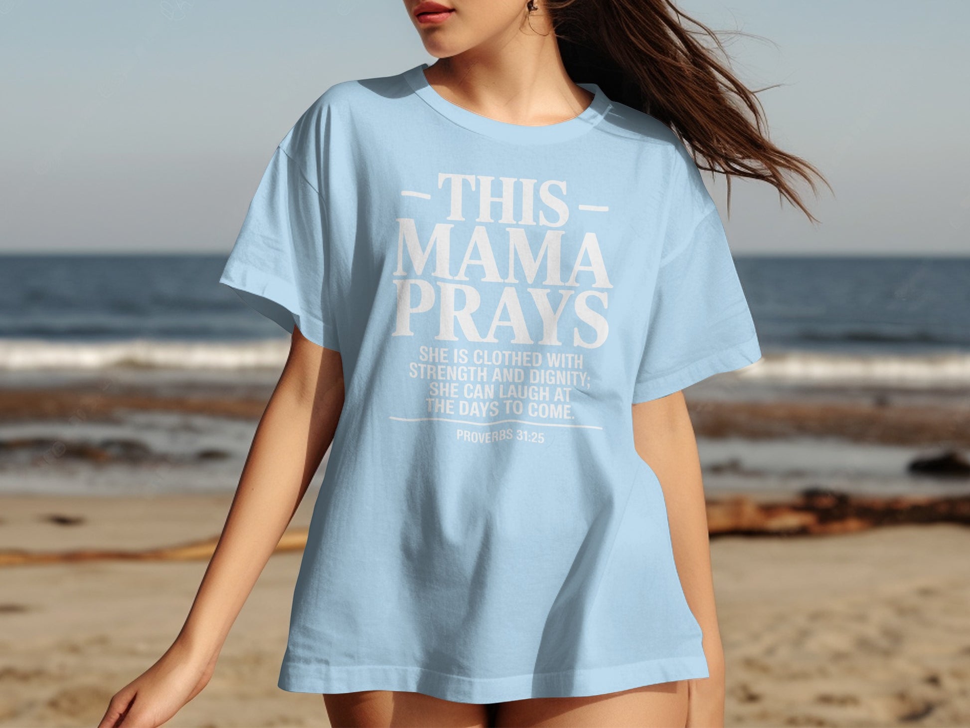 Light blue t-shirt with "This Mama Prays" and Proverbs 31:25 text.